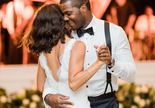 Couple share their first dance at their wedding. 